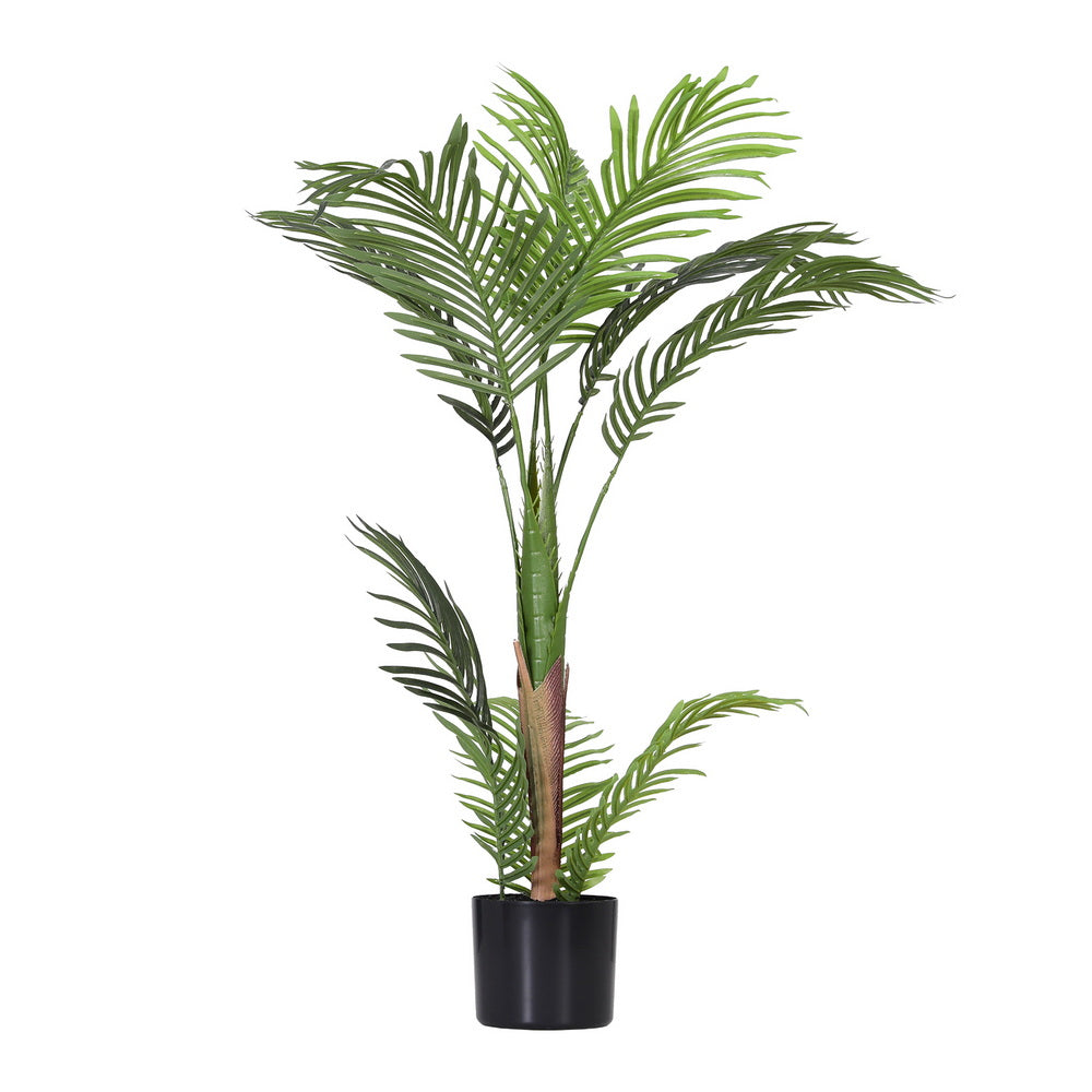 Artificial palm plant in a black pot on a white background