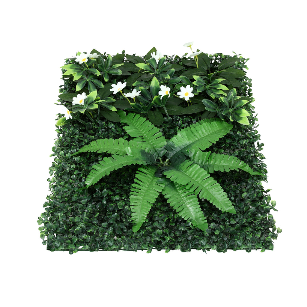 Square arrangement of artificial greenery with ferns and boxwood on a white background