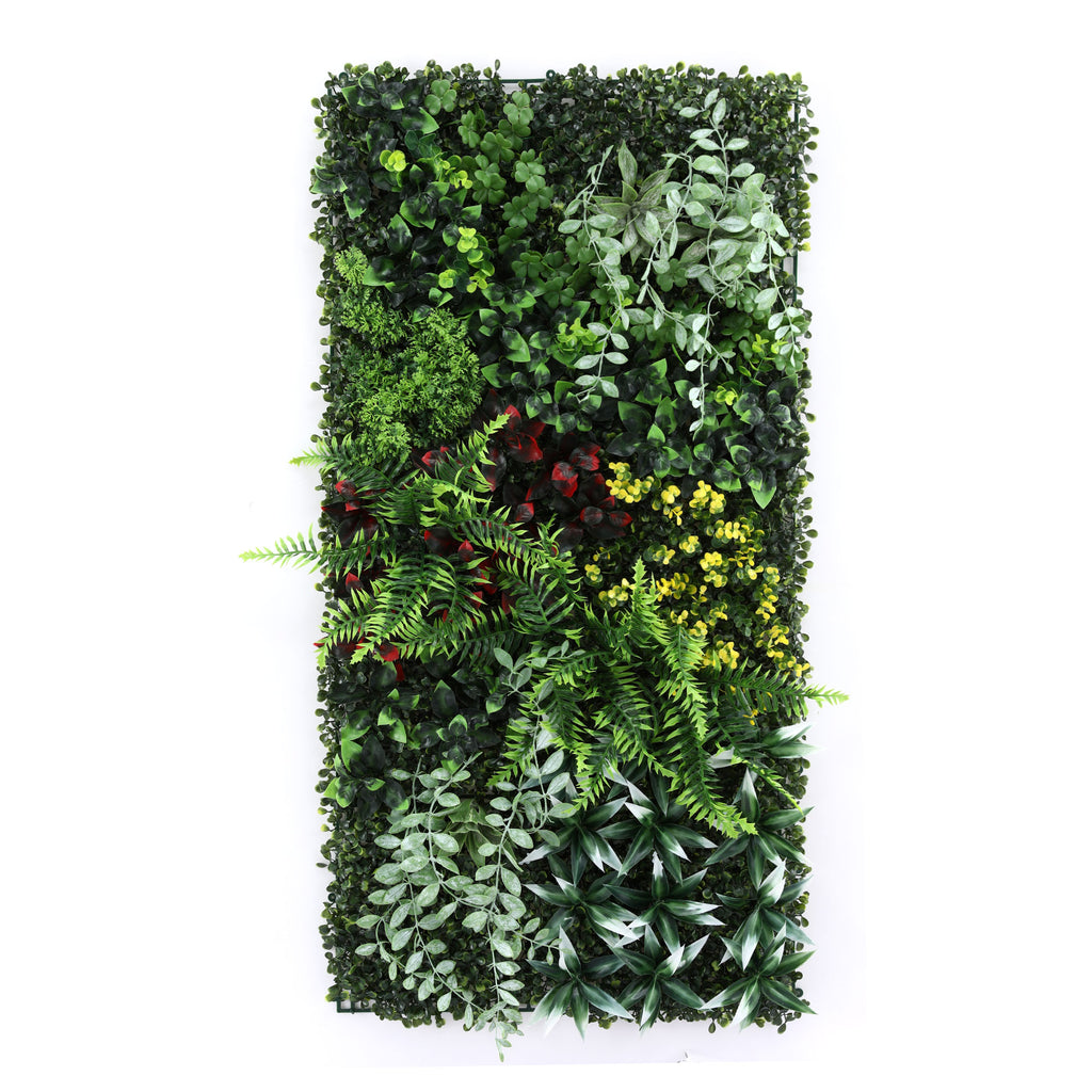 Artificial vertical garden panel with various green plants on a white background