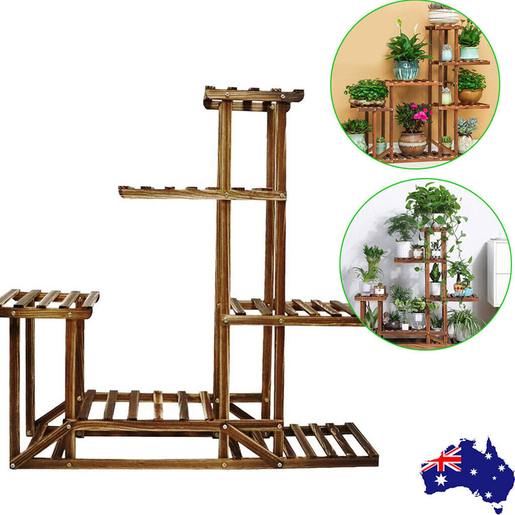 Five-tier wooden plant stand by Faux Flora displaying multiple potted artificial plants in a home garden setting.