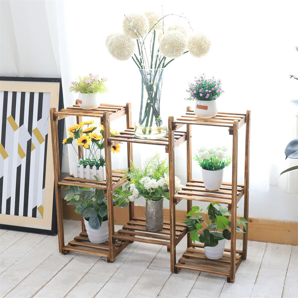 Faux Flora 8-tier wooden plant stand with multiple shelves for displaying artificial plants in home and garden decor.