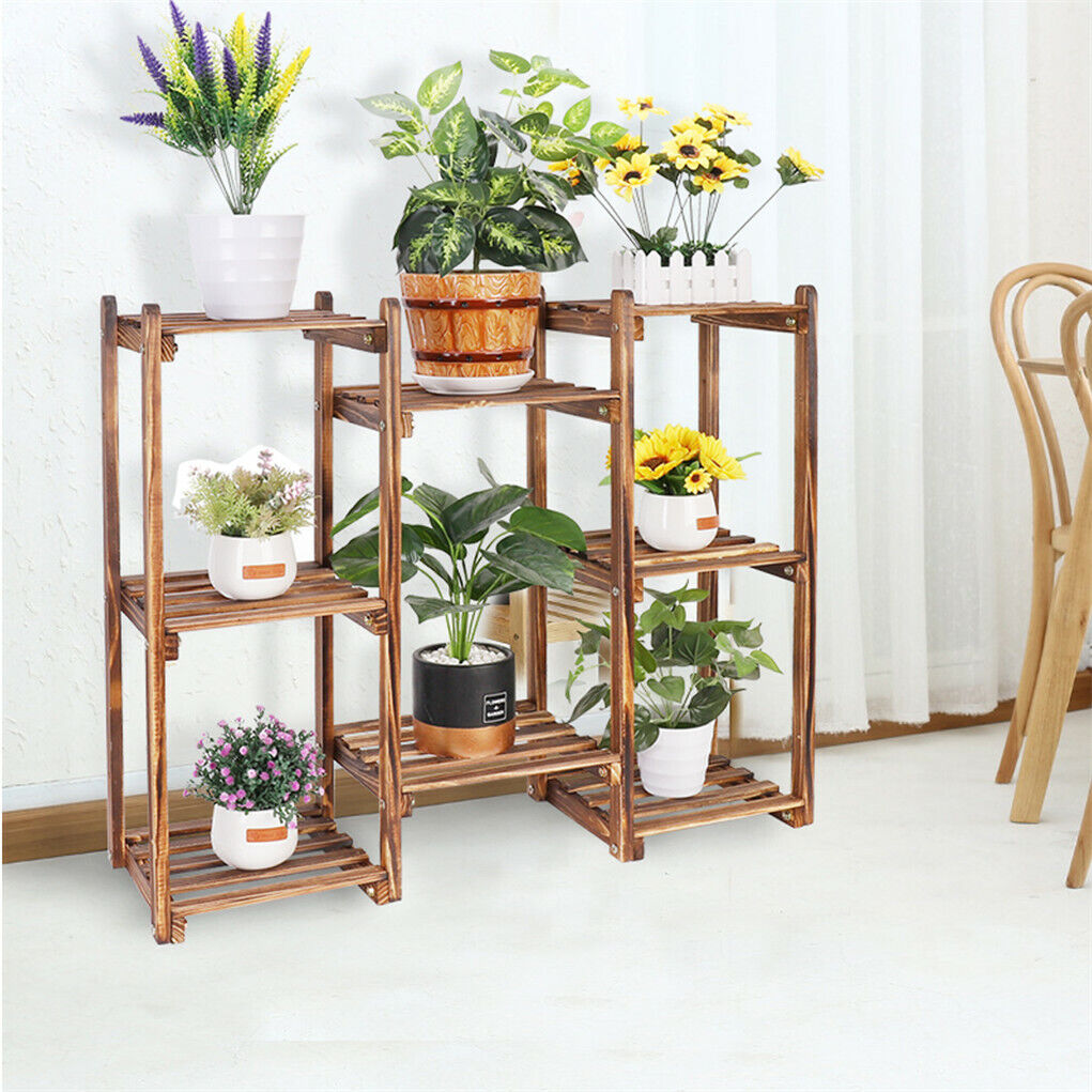 Faux Flora 8-tier wooden plant stand with multiple shelves for displaying artificial plants in a home and garden setting.