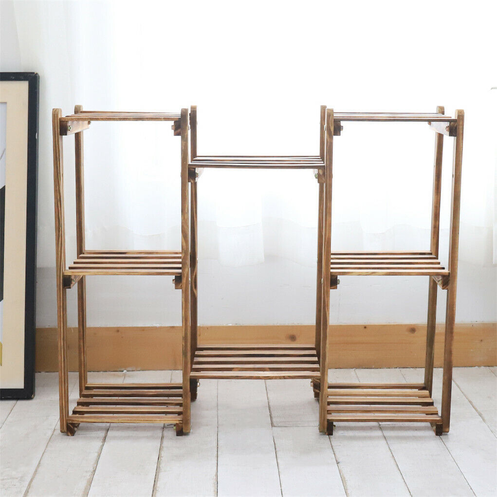 8-tier wooden plant stand by Faux Flora displaying multiple artificial plants on a modern garden shelf.