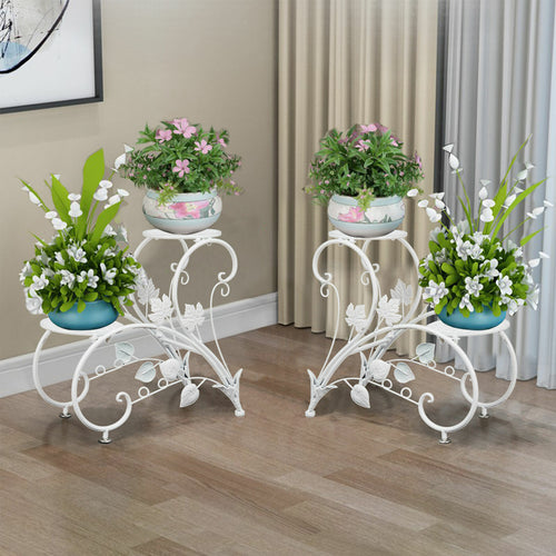 Set of two Faux Flora plant stand shelves with modern black metal frames and wooden shelves for indoor plant display.