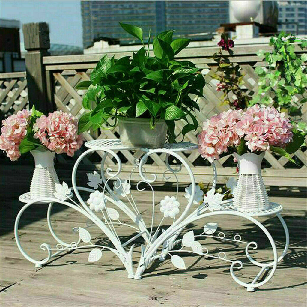 Pair of Faux Flora plant stand shelves with black metal frames and wooden shelves for indoor home and garden decor.