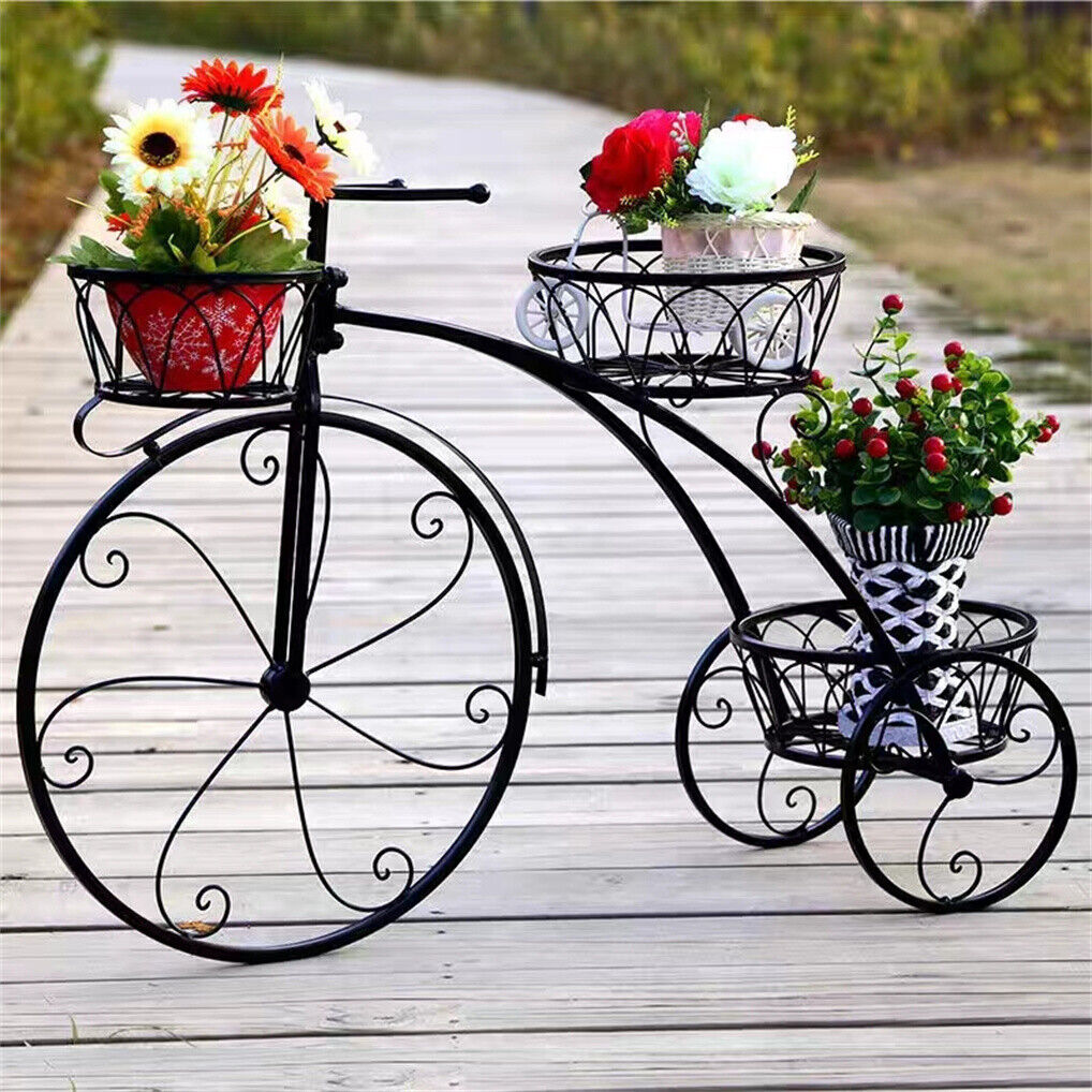 Black iron tricycle plant stand with planters, decorative home and garden accessory by Faux Flora.