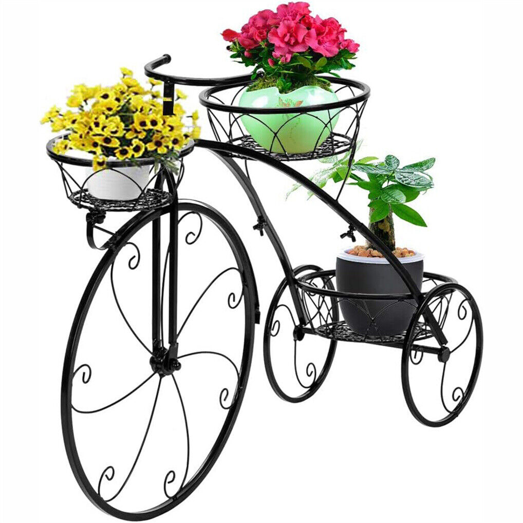 Black iron tricycle plant stand with faux plant and pot, decorative home and garden accessory from Faux Flora.