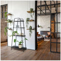 Modern 4-tier plant stand by Faux Flora with multiple levels for displaying artificial plants in a stylish home or garden setting.