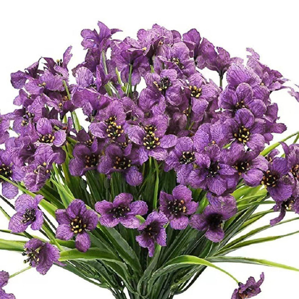 Set of twelve artificial spring grass flowers in orange by Faux Flora, perfect for home and garden decor.