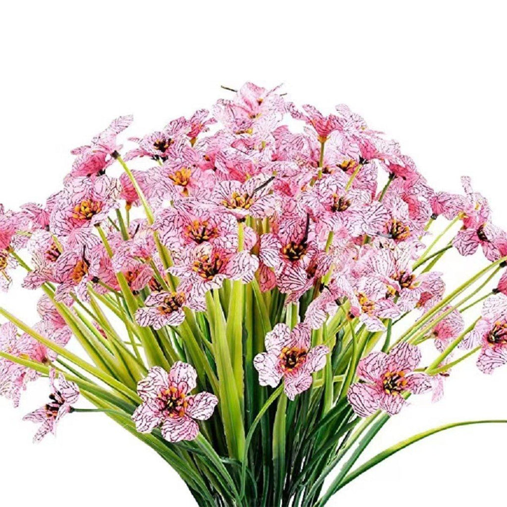 Set of twelve purple artificial spring grass flowers from Faux Flora, ideal for home and garden decor.