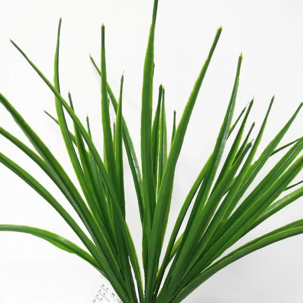 Faux Flora UV resistant grass stem, 30cm tall, artificial plant suitable for home and garden decor in a natural green color.