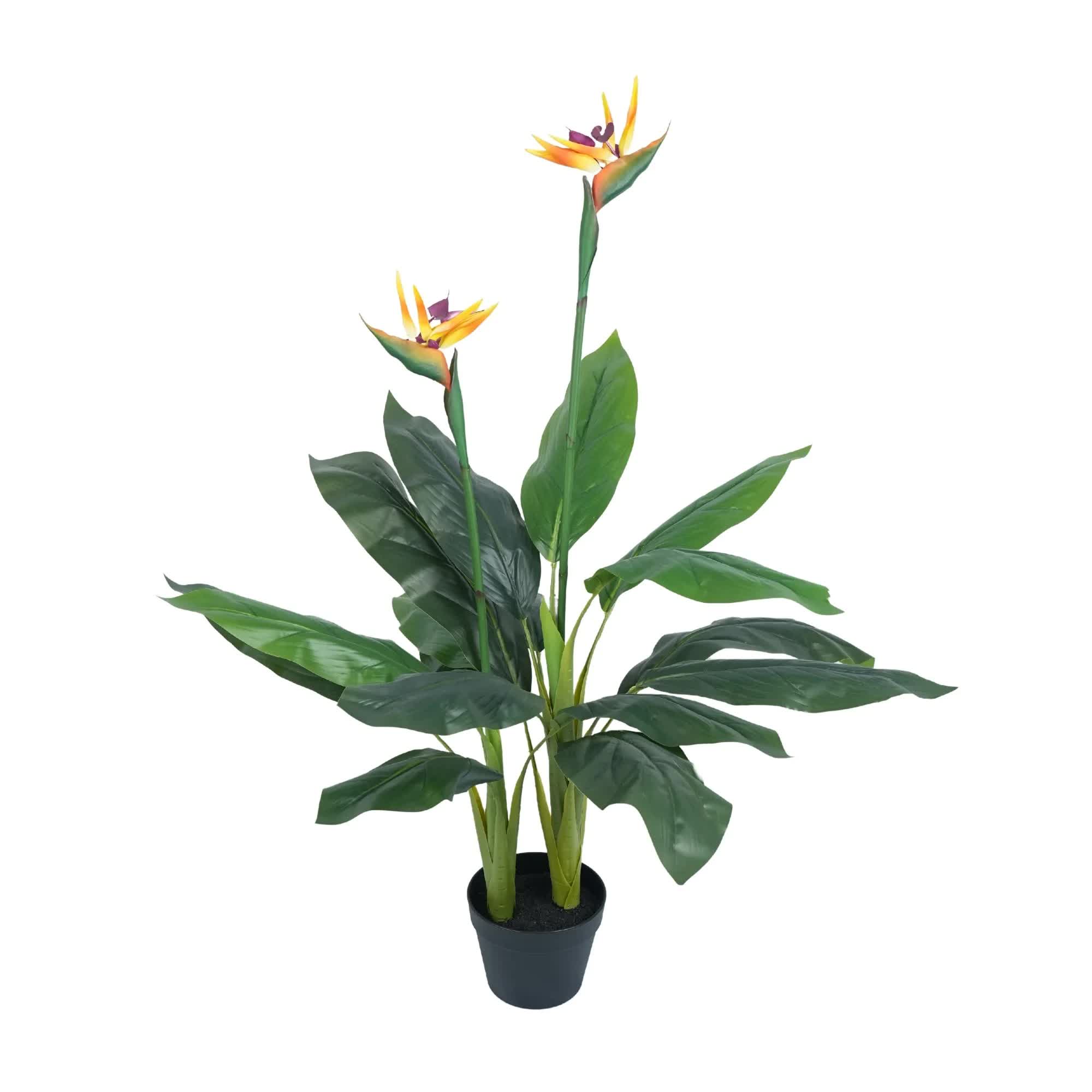 Potted artificial Bird of Paradise plant from Faux Flora, 110cm tall with lush green leaves in a decorative pot.