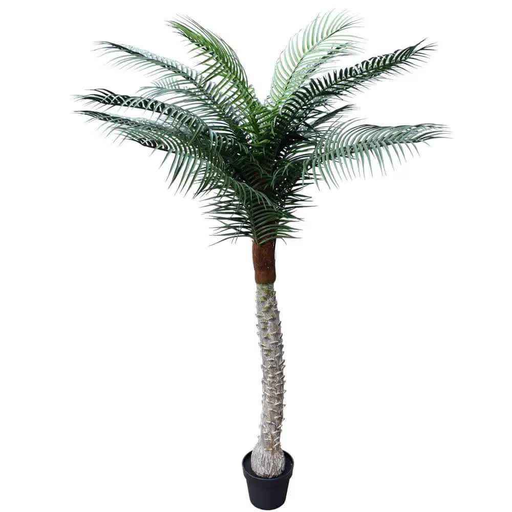 Artificial palm tree in a pot on a white background