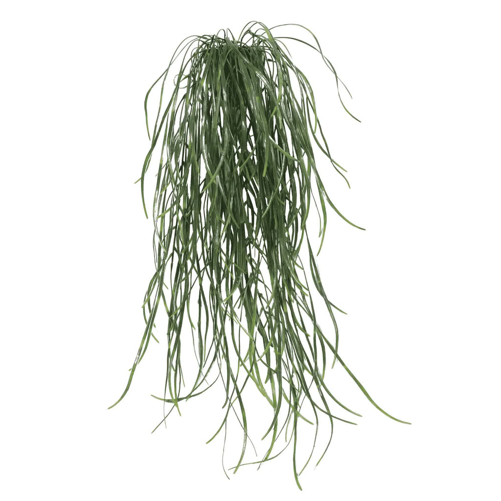 Artificial hanging plant with long green leaves on a white background