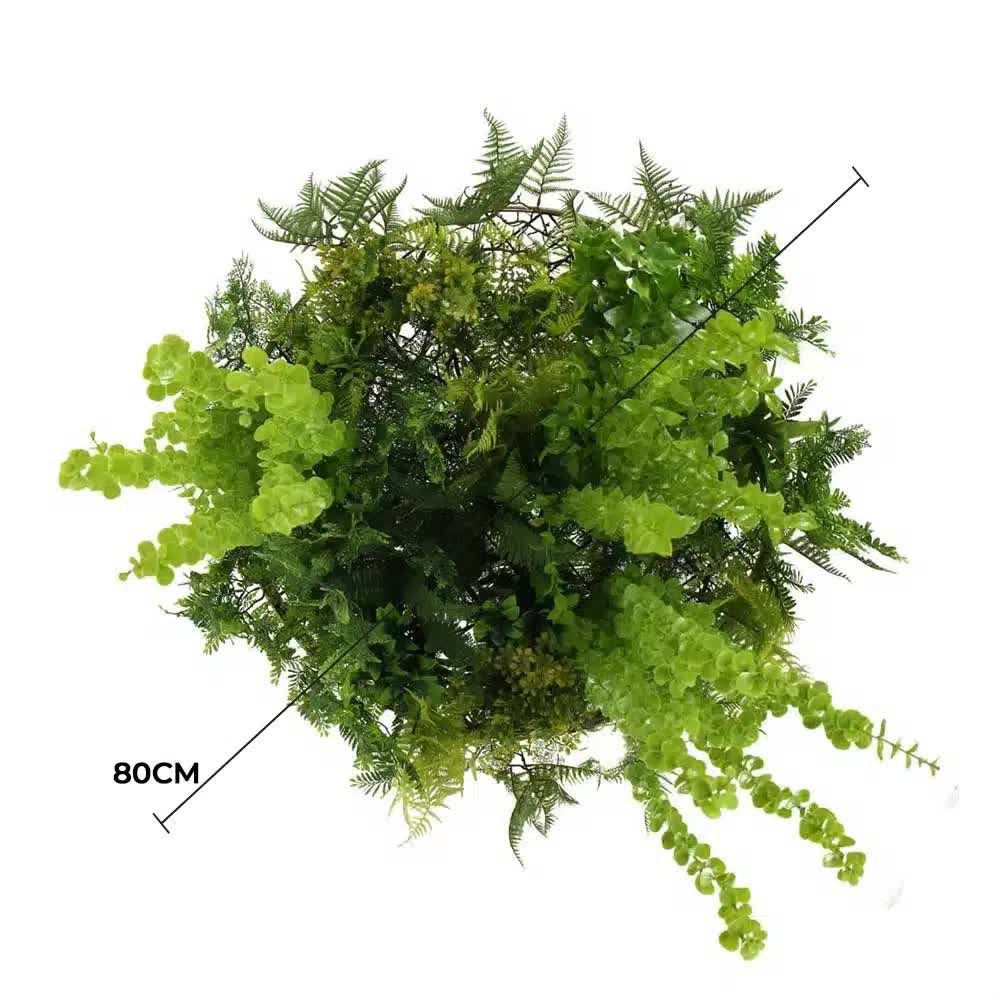 Artificial green foliage arrangement with measurement label on a white background
