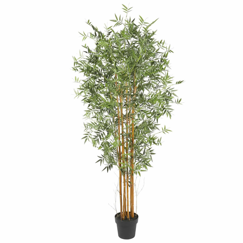 Artificial bamboo plant with green leaves in a pot on a white background