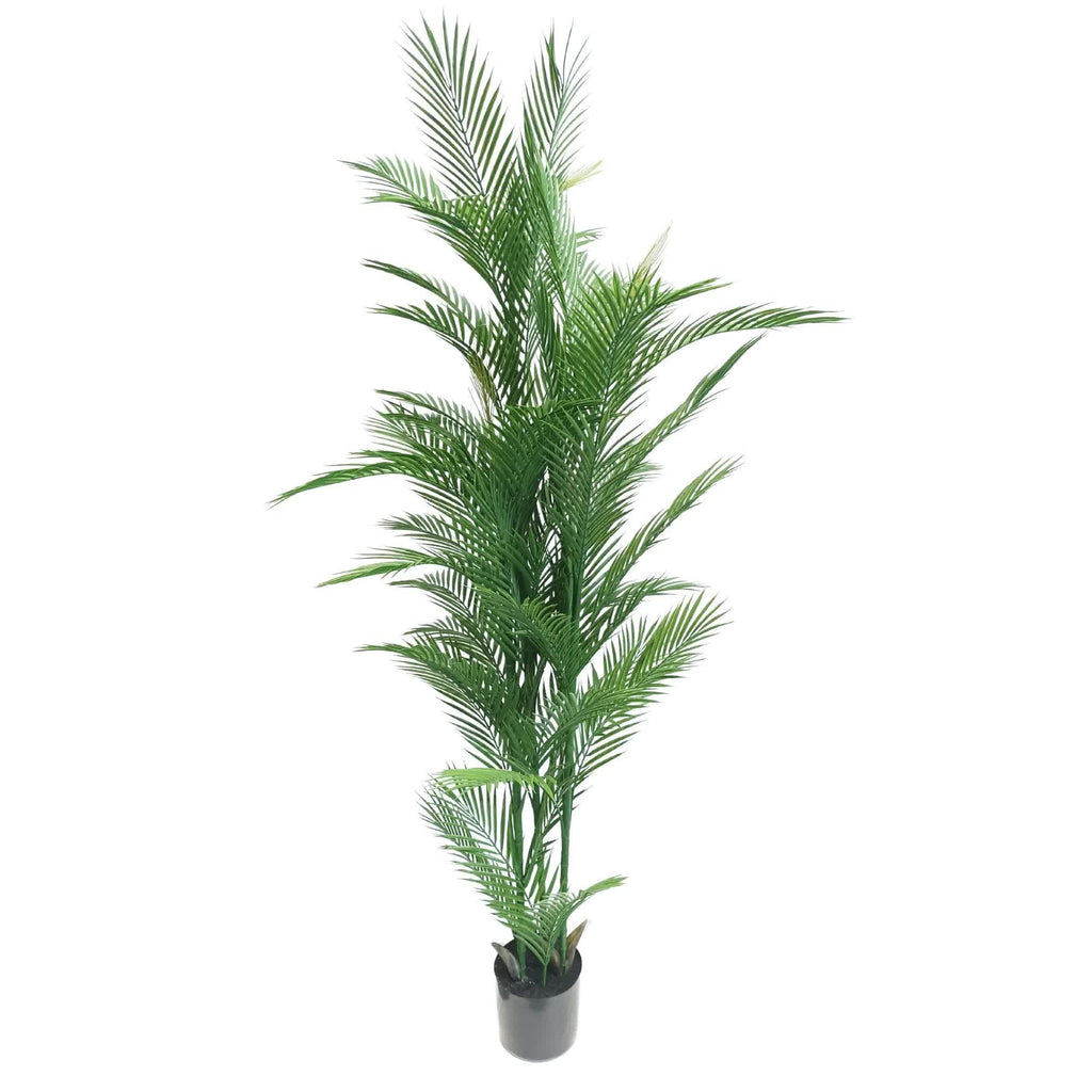 Artificial green palm plant in a pot on a white background
