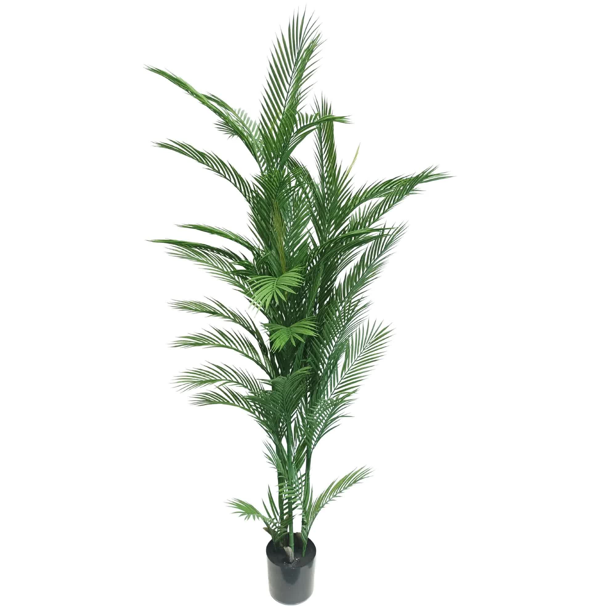 Potted artificial palm tree on a white background