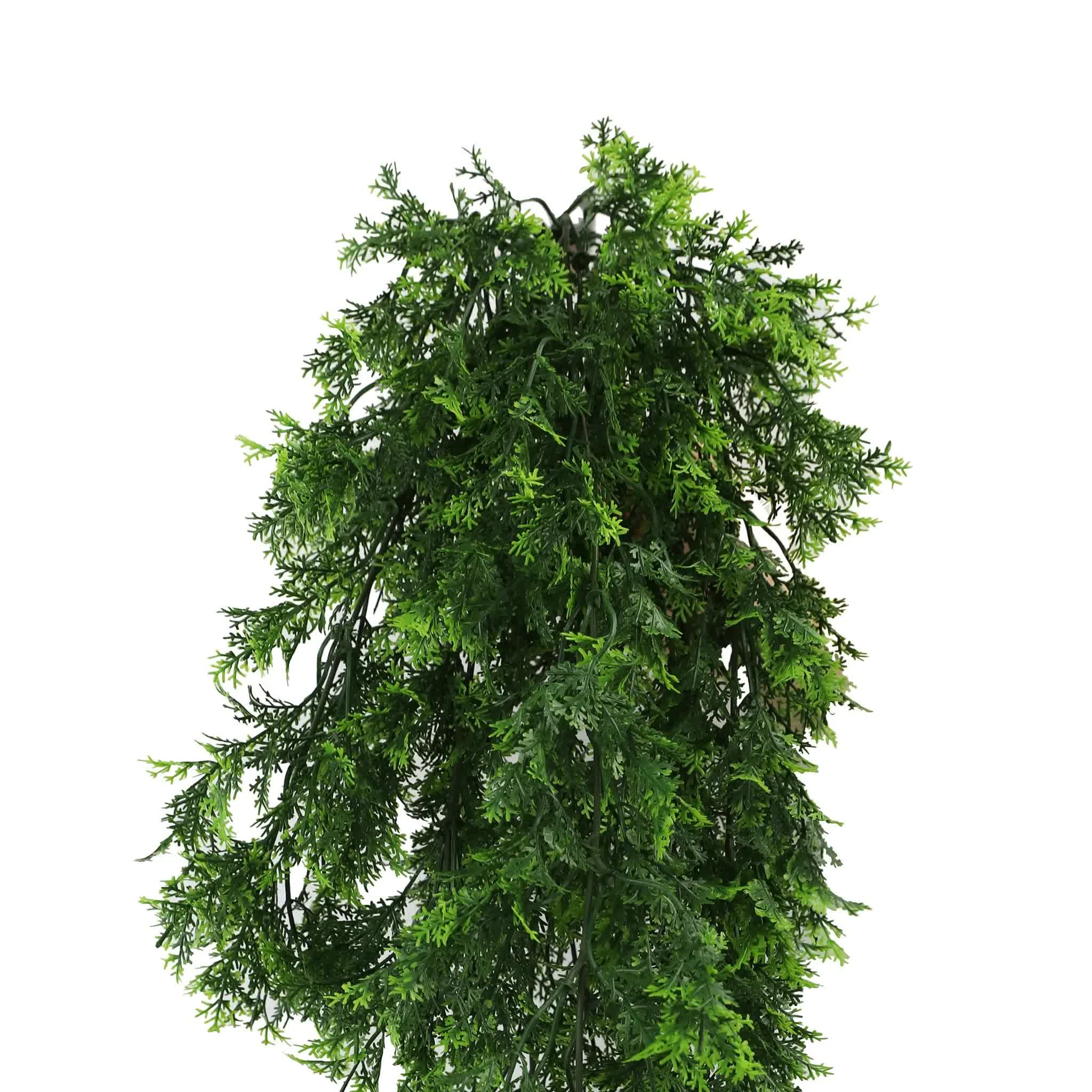 Artificial green garland on a white background
