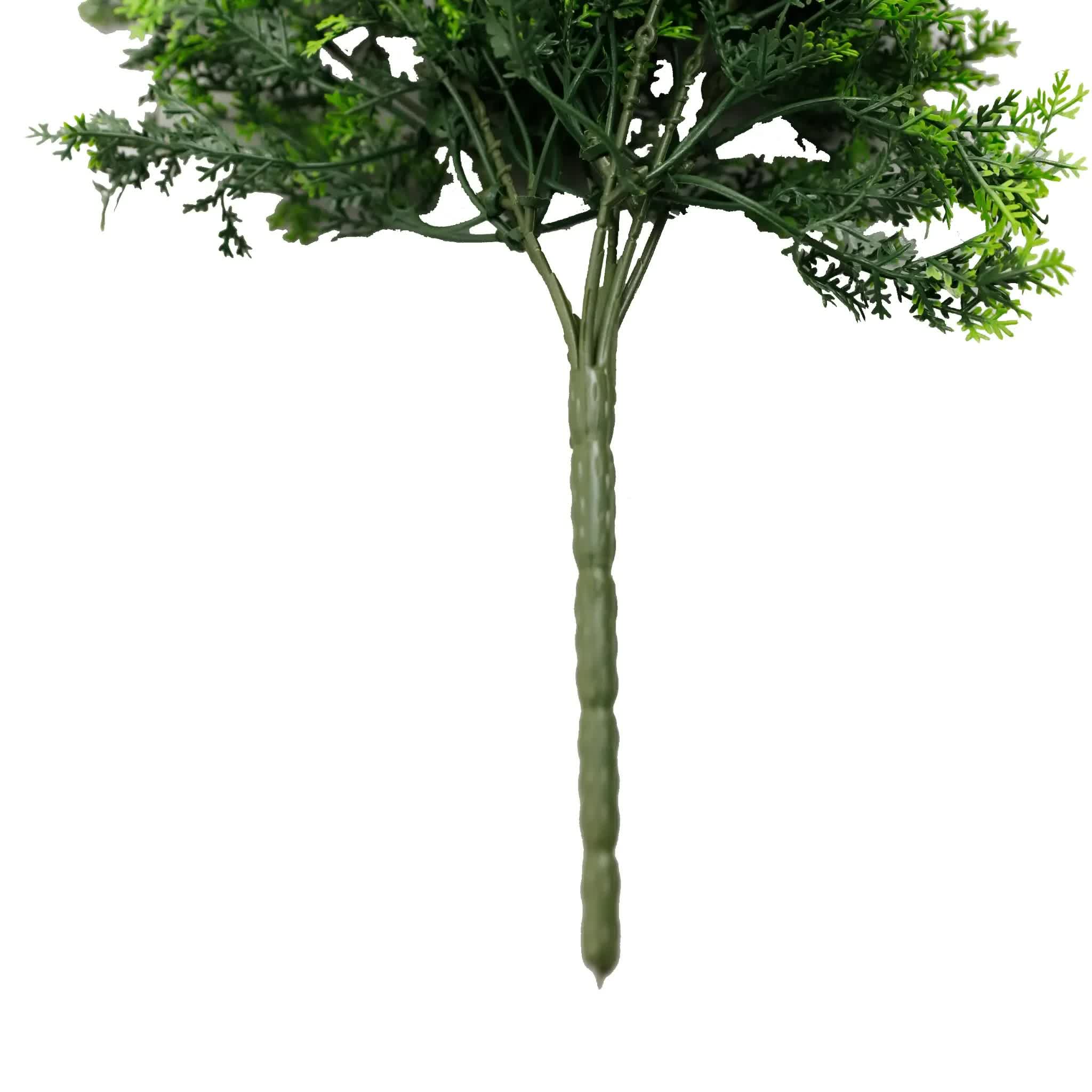 Artificial green bush on a white background