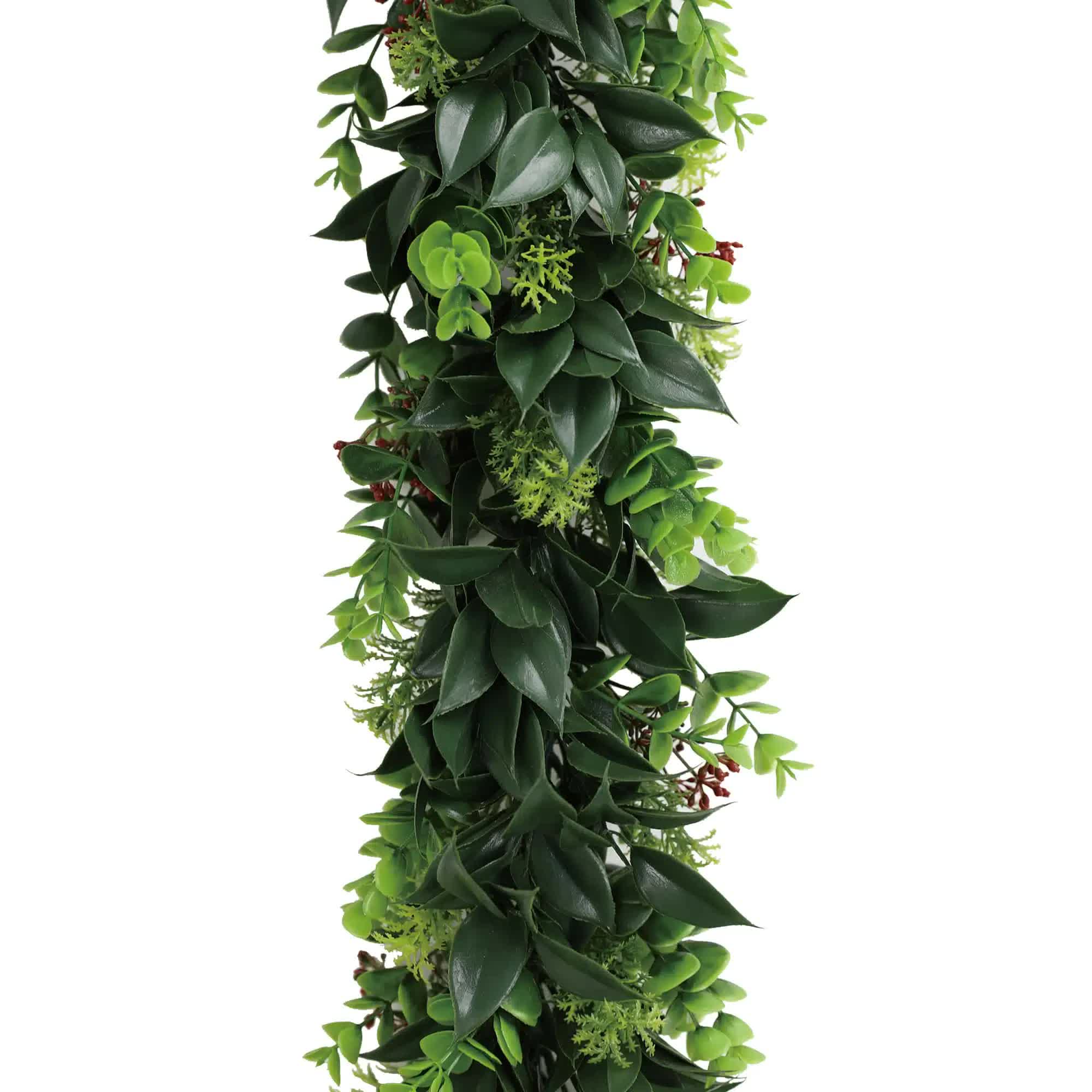 Artificial extendable hanging wreath by Faux Flora, UV resistant 55cm for home and garden decor, with lush green foliage.
