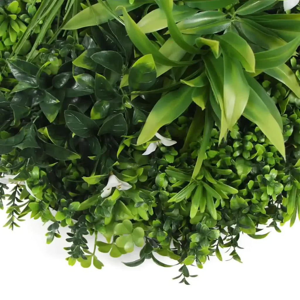 Black-framed 75cm slimline white flowering artificial green wall disc by Faux Flora, UV resistant for home or garden decoration.