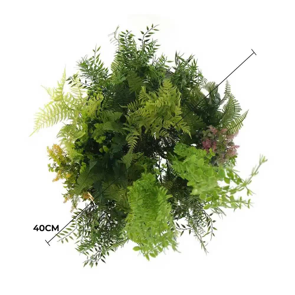 Artificial greenery arrangement with a measurement label on a white background