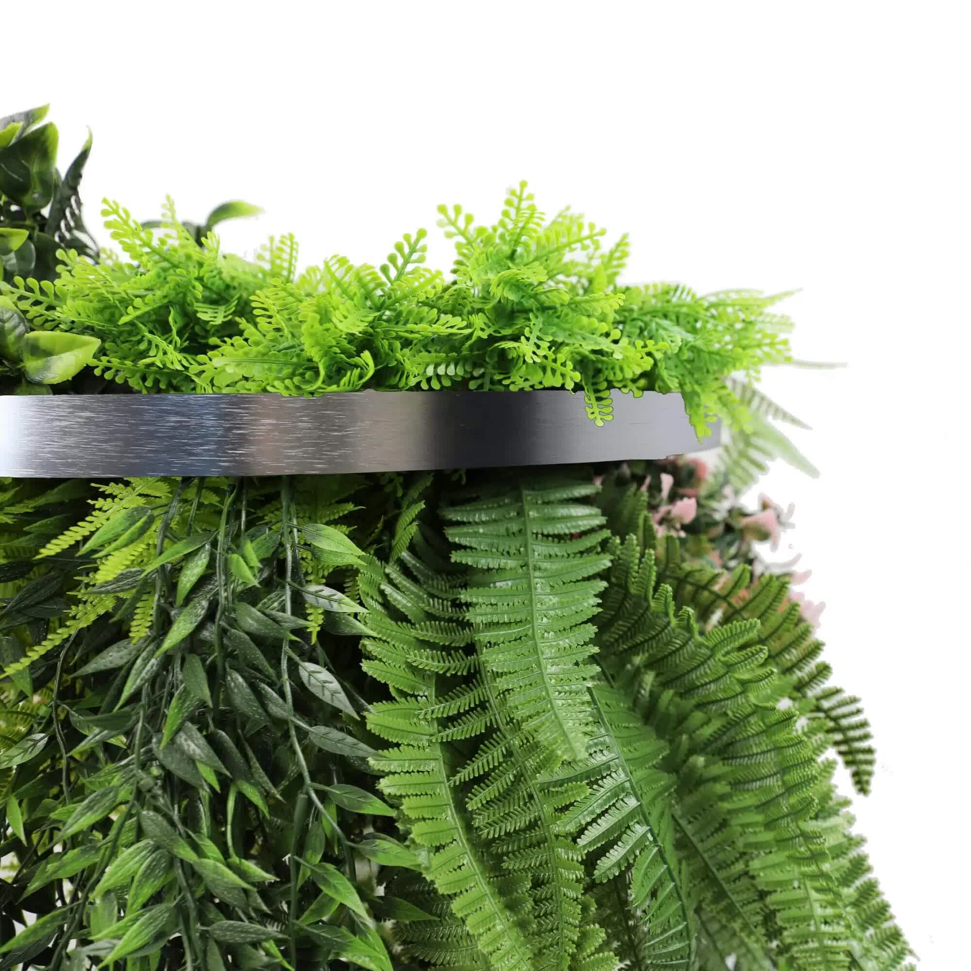 Artificial greenery with a metal shelf on a white background