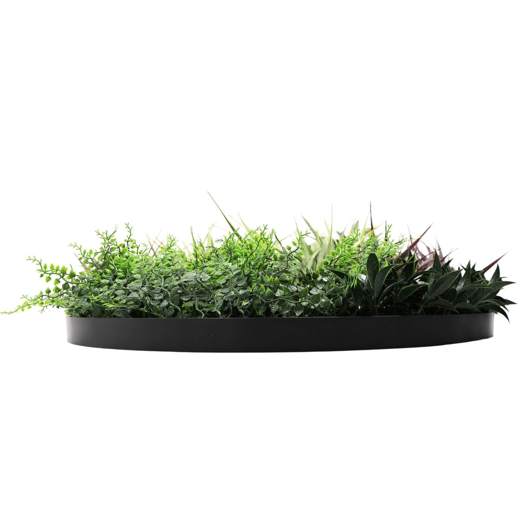Artificial green wall disc with grassy fern design by Faux Flora, UV resistant, black 80cm decorative wall plant for home and garden.